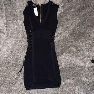 BeBe black fitted dress with gold accents, size XS - new with tags